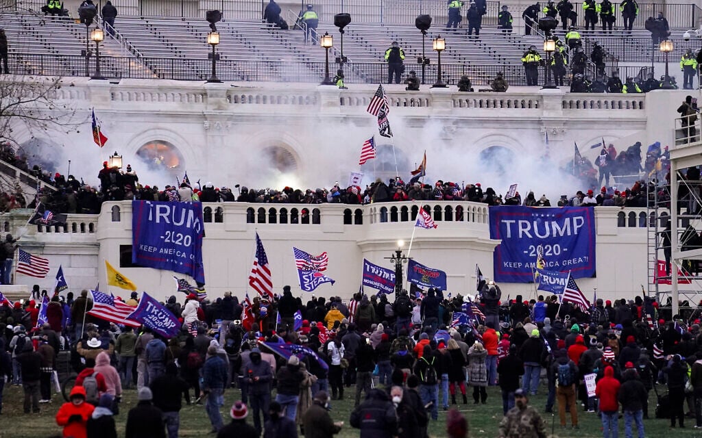 Violent protesters, loyal to US President Donald Trump, storm the Capitol on January 6, 2021, in Washington. (AP/ John Minchillo) Violent protesters, loyal to US President Donald Trump, storm the Capitol on January 6, 2021, in Washington. (AP/ John Minchillo)