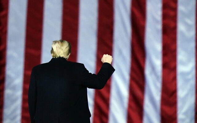Then US president Donald Trump gestures at a campaign rally in Dalton, Georgia, January 4, 2021. (AP Photo/Brynn Anderson) Then US president Donald Trump gestures at a campaign rally in Dalton, Georgia, January 4, 2021. (AP Photo/Brynn Anderson)
