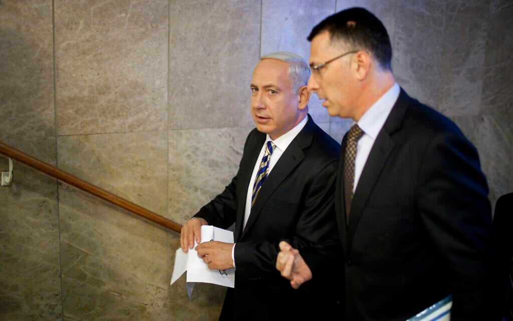 In this August 26, 2012 photo, then-Prime Minister Benjamin Netanyahu (left) speaks to then-Education Minister Gideon Sa'ar as they arrive at the weekly cabinet meeting in Jerusalem. (AP Photo/Uriel Sinai/Getty Images, Pool, File) In this August 26, 2012 photo, then-Prime Minister Benjamin Netanyahu (left) speaks to then-Education Minister Gideon Sa'ar as they arrive at the weekly cabinet meeting in Jerusalem. (AP Photo/Uriel Sinai/Getty Images, Pool, File)