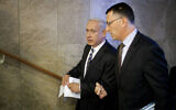 In this August 26, 2012 photo, then-Prime Minister Benjamin Netanyahu (left) speaks to then-Education Minister Gideon Sa'ar as they arrive at the weekly cabinet meeting in Jerusalem. (AP Photo/Uriel Sinai/Getty Images, Pool, File)