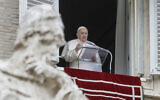 Pope Francis delivers his message during the Angelus noon prayer from the window of his studio overlooking St.Peter's Square, on the Immaculate Conception day, at the Vatican, December 8, 2020. (AP Photo/Andrew Medichini, file)