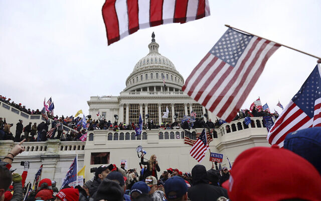 In this January 6, 2021 photo, supporters of President Donald Trump gather outside the US Capitol in Washington. (AP Photo/Shafkat Anowar) In this January 6, 2021 photo, supporters of President Donald Trump gather outside the US Capitol in Washington. (AP Photo/Shafkat Anowar)