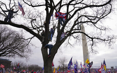 Supporters of US President Donald Trump participate in a rally in Washington, January 6, 2021. (AP Photo/John Minchillo, File)