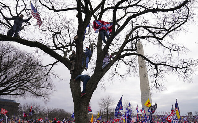 Supporters of US President Donald Trump participate in a rally in Washington, January 6, 2021. (AP Photo/John Minchillo, File) Supporters of US President Donald Trump participate in a rally in Washington, January 6, 2021. (AP Photo/John Minchillo, File)