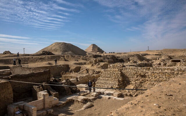 CORRECTS DAY OF WEEK TO SUNDAY -- The excavation site where Egyptian archaeologist Zahi Hawass and his team unearthed a trove of ancient coffins, artifacts, and skulls in a vast necropolis south of Cairo, Egypt, January 17, 2021, in Saqqara, south of Cairo, Egypt. (AP Photo/Nariman El-Mofty)
