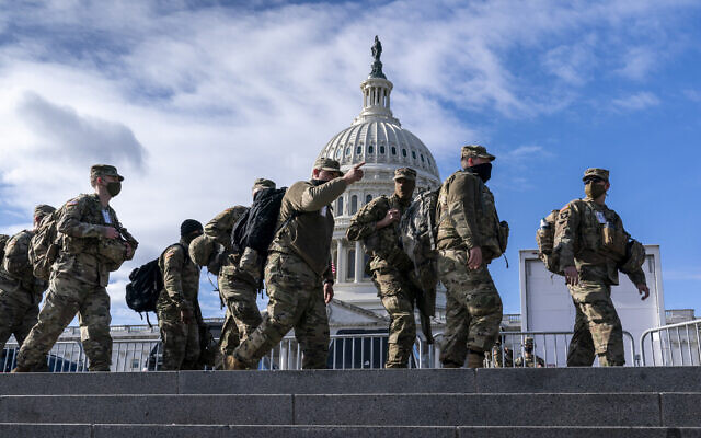National Guard troops reinforce security around the US Capitol ahead of the inauguration of President-elect Joe Biden and Vice President-elect Kamala Harris, Sunday, Jan. 17, 2021, in Washington. (AP Photo/J. Scott Applewhite) National Guard troops reinforce security around the US Capitol ahead of the inauguration of President-elect Joe Biden and Vice President-elect Kamala Harris, Sunday, Jan. 17, 2021, in Washington. (AP Photo/J. Scott Applewhite)