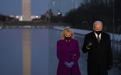 US President-elect Joe Biden and his wife Jill Biden participate in a COVID-19 memorial event at the Lincoln Memorial Reflecting Pool on Jan. 19, 2021, in Washington. (AP/Evan Vucci)