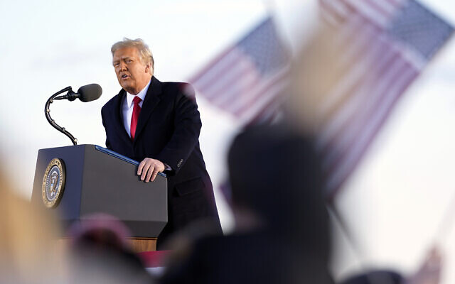 US President Donald Trump speaks before boarding Air Force One at Andrews Air Force Base, Md., Wednesday, Jan. 20, 2021. (AP Photo/Manuel Balce Ceneta) US President Donald Trump speaks before boarding Air Force One at Andrews Air Force Base, Md., Wednesday, Jan. 20, 2021. (AP Photo/Manuel Balce Ceneta)