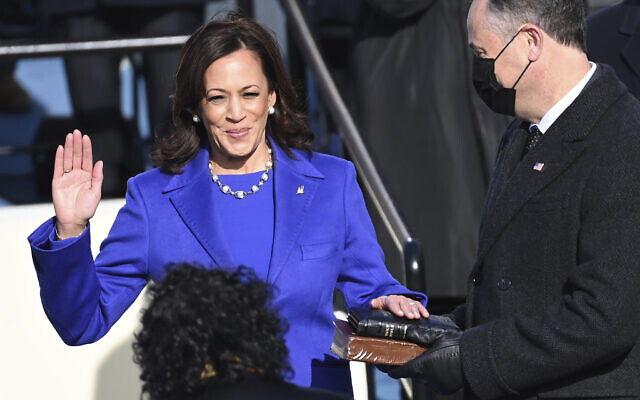 Kamala Harris is sworn in as US vice president by Supreme Court Justice Sonia Sotomayor as her husband Doug Emhoff holds the Bible during the 59th Presidential Inauguration at the US Capitol in Washington on Jan. 20, 2021.(Saul Loeb/Pool Photo via AP) Kamala Harris is sworn in as US vice president by Supreme Court Justice Sonia Sotomayor as her husband Doug Emhoff holds the Bible during the 59th Presidential Inauguration at the US Capitol in Washington on Jan. 20, 2021.(Saul Loeb/Pool Photo via AP)