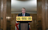 Britain's Prime Minister Boris Johnson speaks during a coronavirus press conference at 10 Downing Street in London, Friday Jan. 22, 2021. Johnson announced that the new variant of COVID-19, which was first discovered in the south of England, may be linked with an increase in the mortality rate. (Leon Neal/Pool via AP)