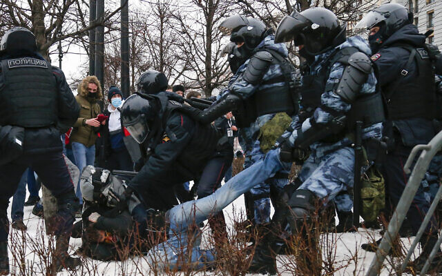 Police detain a man during a protest against the jailing of opposition leader Alexei Navalny in Moscow, Russia, January 23, 2021. (AP/Alexander Zemlianichenko)