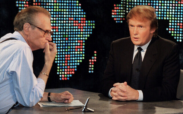 In this Oct. 7, 1999 photo, Donald Trump is interviewed by Larry King during a taping of "Larry King Live,"  in New York. (AP Photo/Marty Lederhandler, File)