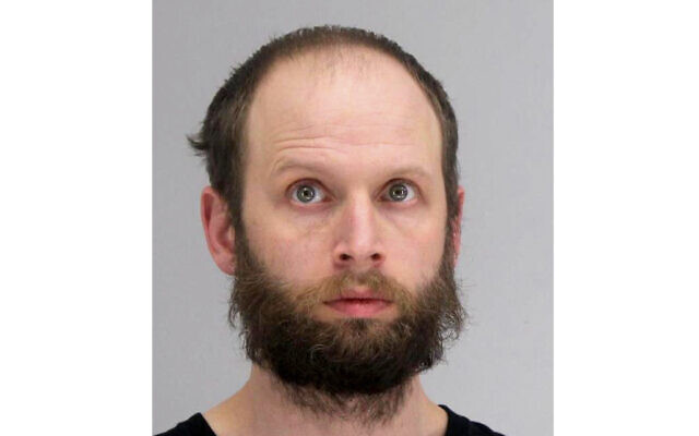 This photo provided by the Dallas County Sheriff's Office shows Garrett Miller. Miller has been arrested for allegedly taking part in the storming of the U.S. Capitol this month and posting violent threats, including a call to assassinate Democratic Rep. Alexandria Ocasio-Cortez of New York. (Dallas County Sheriff's Office via AP) This photo provided by the Dallas County Sheriff's Office shows Garrett Miller. Miller has been arrested for allegedly taking part in the storming of the U.S. Capitol this month and posting violent threats, including a call to assassinate Democratic Rep. Alexandria Ocasio-Cortez of New York. (Dallas County Sheriff's Office via AP)