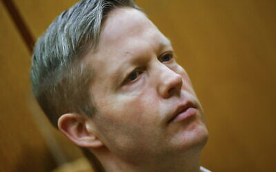 Defendant Stephan Ernst looks on in the courtroom at the higher regional court in Frankfurt, Germany, January 28, 2021. (Kai Pfaffenbach/Pool Photo via AP)