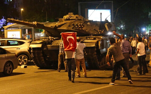 In this July 16, 2016 photo, tanks, part of the forces that attempted a coup, move into position as people attempt to stop them, in Ankara, Turkey. (AP Photo/File) In this July 16, 2016 photo, tanks, part of the forces that attempted a coup, move into position as people attempt to stop them, in Ankara, Turkey. (AP Photo/File)