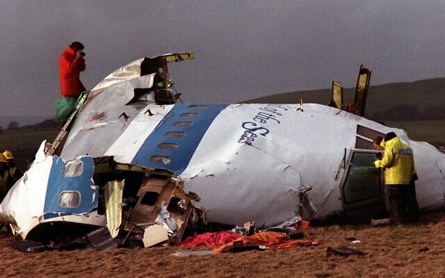 In this December 22, 1988 file photo police and investigators look at what remains of the flight deck of Pan Am 103 in a field in Lockerbie, Scotland. In 1988, 270 people were killed when a terrorist bomb exploded aboard a Pam Am Boeing 747 over Lockerbie, Scotland, sending wreckage crashing to the ground. (AP Photo/File) In this December 22, 1988 file photo police and investigators look at what remains of the flight deck of Pan Am 103 in a field in Lockerbie, Scotland. In 1988, 270 people were killed when a terrorist bomb exploded aboard a Pam Am Boeing 747 over Lockerbie, Scotland, sending wreckage crashing to the ground. (AP Photo/File)