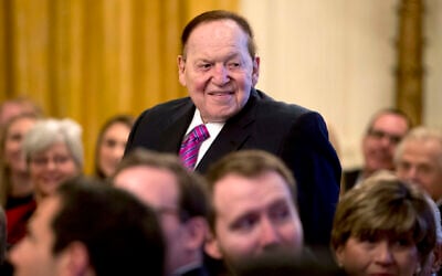 In this Nov. 16, 2018, file photo, Las Vegas Sands Corporation Chief Executive and Republican mega donor Sheldon Adelson, stands as he is recognized by President Donald Trump during a Medal of Freedom ceremony in the East Room of the White House in Washington.  (AP Photo/Andrew Harnik, File)