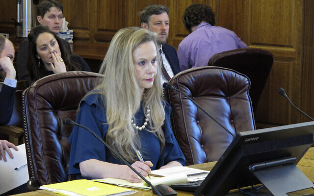 Alaska Department of Administration Commissioner Kelly Tshibaka appears before a state House committee in Juneau, Alaska, Feb. 6, 2020. (Becky Bohrer/AP) Alaska Department of Administration Commissioner Kelly Tshibaka appears before a state House committee in Juneau, Alaska, Feb. 6, 2020. (Becky Bohrer/AP)