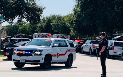Illustrative: Police and other emergency vehicles are gathered near where three police officers were shot Sunday, Aug. 16, 2020 in Cedar Park, Texas.  (Andy Way/KXAN-TV via AP)