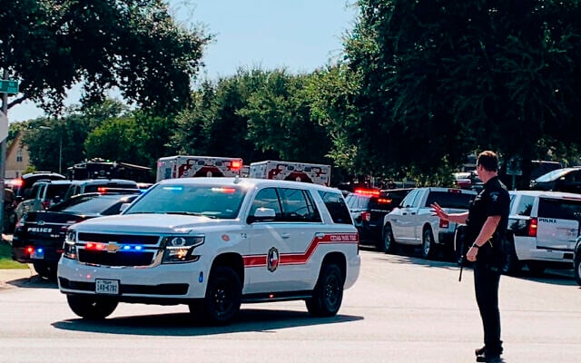 Illustrative: Police and other emergency vehicles are gathered near where three police officers were shot Sunday, Aug. 16, 2020 in Cedar Park, Texas. (Andy Way/KXAN-TV via AP) Illustrative: Police and other emergency vehicles are gathered near where three police officers were shot Sunday, Aug. 16, 2020 in Cedar Park, Texas. (Andy Way/KXAN-TV via AP)