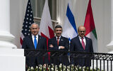 Then-prime minister Benjamin Netanyahu, left; United Arab Emirates Foreign Minister Abdullah bin Zayed al-Nahyan; and Bahrain Foreign Minister Khalid bin Ahmed Al Khalifa; at the White House, Sept. 15, 2020. (AP Photo/Alex Brandon)