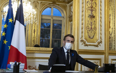 Illustrative: French President Emmanuel Macron speaks on the telephone to US President-elect Joe Biden, at the Elysee Palace in Paris, Tuesday, Nov. 10, 2020. (Ian Langsdon, Pool via AP)