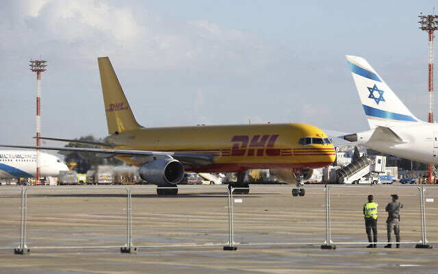 File: A plane of the international courier company DHL, carrying over 100,000 doses of the first batch of Pfizer coronavirus vaccines, lands at Ben Gurion Airport near Tel Aviv, Wednesday, Dec. 9, 2020 (Abir Sultan/Pool Photo via AP) File: A plane of the international courier company DHL, carrying over 100,000 doses of the first batch of Pfizer coronavirus vaccines, lands at Ben Gurion Airport near Tel Aviv, Wednesday, Dec. 9, 2020 (Abir Sultan/Pool Photo via AP)