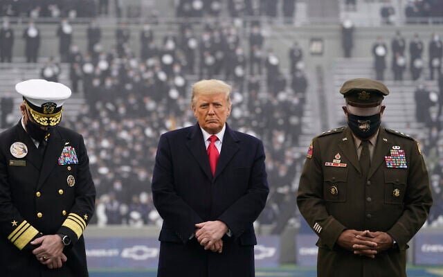 In this Dec. 12, 2020, file photo US President Donald Trump stands on the field before the 121st Army-Navy Football Game in Michie Stadium at the United States Military Academy in West Point, N.Y. (AP Photo/Andrew Harnik, File) In this Dec. 12, 2020, file photo US President Donald Trump stands on the field before the 121st Army-Navy Football Game in Michie Stadium at the United States Military Academy in West Point, N.Y. (AP Photo/Andrew Harnik, File)