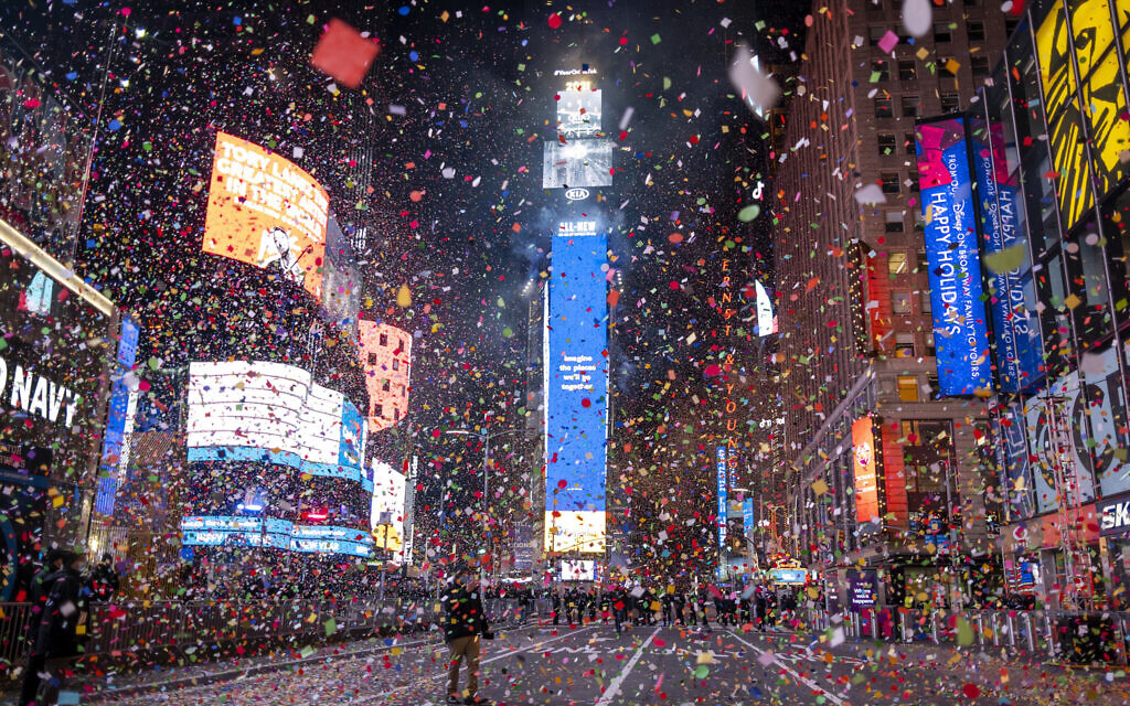 Confetti flies after the Times Square New Year's Eve Ball drops in a nearly empty Times Square, early Friday, Jan. 1, 2021, as the area normally packed with revelers remained closed off due to the ongoing coronavirus pandemic. (AP Photo/Craig Ruttle) Confetti flies after the Times Square New Year's Eve Ball drops in a nearly empty Times Square, early Friday, Jan. 1, 2021, as the area normally packed with revelers remained closed off due to the ongoing coronavirus pandemic. (AP Photo/Craig Ruttle)