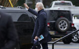 President-elect Joe Biden waves as he walks from St. Edmond Catholic Church after attending Mass in Rehoboth Beach, Del., January 3, 2021. (AP Photo/Carolyn Kaster)