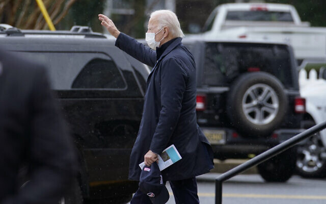 President-elect Joe Biden waves as he walks from St. Edmond Catholic Church after attending Mass in Rehoboth Beach, Del., January 3, 2021. (AP Photo/Carolyn Kaster) President-elect Joe Biden waves as he walks from St. Edmond Catholic Church after attending Mass in Rehoboth Beach, Del., January 3, 2021. (AP Photo/Carolyn Kaster)