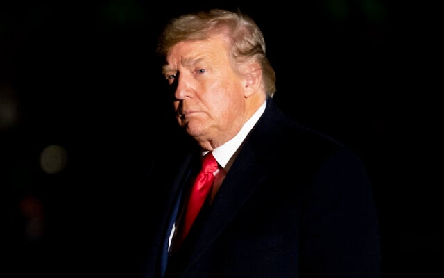 US President Donald Trump arrives in the early morning hours, Tuesday, Jan. 5, 2021, at the White House in Washington, after returning from a rally in Dalton, Georgia (AP Photo/Andrew Harnik) US President Donald Trump arrives in the early morning hours, Tuesday, Jan. 5, 2021, at the White House in Washington, after returning from a rally in Dalton, Georgia (AP Photo/Andrew Harnik)