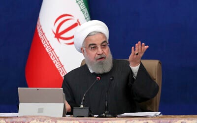 Iranian President Hassan Rouhani speaks during a cabinet meeting in Tehran, Iran, January 6, 2021. (Iranian Presidency Office via AP)