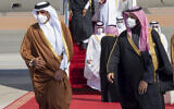 Saudi Arabia's Crown Prince Mohammed bin Salman, right, welcomes Qatar's Emir Sheikh Tamim bin Hamad al-Thani upon his arrival in Al-Ula, Saudi Arabia, January 5, 2021. (Saudi Royal Court via AP, File)