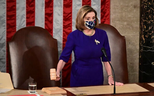 US Speaker of the House Nancy Pelosi bangs the Speaker's gavel as a joint session of the House and Senate convenes to confirm the Electoral College votes cast in November's election, at the Capitol in Washington, Wednesday, Jan. 6, 2021 (Erin Scott/Pool via AP) US Speaker of the House Nancy Pelosi bangs the Speaker's gavel as a joint session of the House and Senate convenes to confirm the Electoral College votes cast in November's election, at the Capitol in Washington, Wednesday, Jan. 6, 2021 (Erin Scott/Pool via AP)