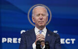 US President-elect Joe Biden speaks at The Queen theater in Wilmington, Del., Wednesday, Jan. 6, 2021 (AP Photo/Susan Walsh)