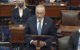Senate Minority Leader Chuck Schumer speaks as the Senate reconvenes after protesters stormed into the US Capitol, January 6, 2021. (Senate Television via AP)