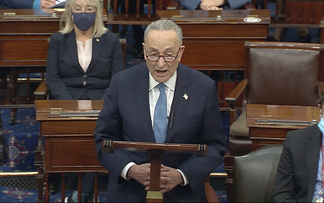 Senate Minority Leader Chuck Schumer speaks as the Senate reconvenes after protesters stormed into the US Capitol, January 6, 2021. (Senate Television via AP) Senate Minority Leader Chuck Schumer speaks as the Senate reconvenes after protesters stormed into the US Capitol, January 6, 2021. (Senate Television via AP)