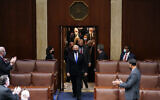 Vice President Mike Pence walks onto the House floor to officiate a joint session of the House and Senate to confirm Electoral College votes at the Capitol, Jan 7, 2021, in Washington. (AP Photo/Andrew Harnik)
