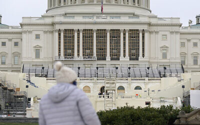 Preparations take place for US President-elect Joe Biden's inauguration on the West Front of the U.S. Capitol in Washington, Friday, Jan. 8, 2021, after supporters of President Donald Trump stormed the building. (AP Photo/Patrick Semansky)