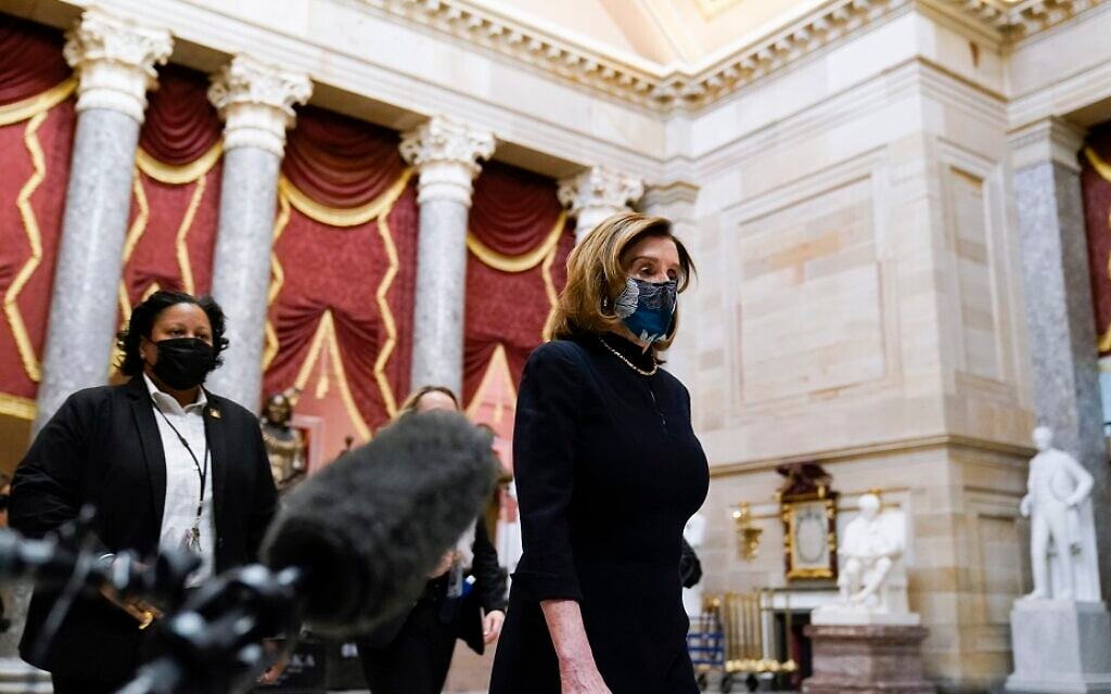 US Speaker of the House Nancy Pelosi at the Capitol in Washington, Wednesday, Jan. 13, 2021, as the House of Representatives pursues an article of impeachment against President Donald Trump for his role in inciting an angry mob to storm the Capitol last week. (AP Photo/Susan Walsh) US Speaker of the House Nancy Pelosi at the Capitol in Washington, Wednesday, Jan. 13, 2021, as the House of Representatives pursues an article of impeachment against President Donald Trump for his role in inciting an angry mob to storm the Capitol last week. (AP Photo/Susan Walsh)