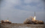 Illustrative: In this photo released January 16, 2021, by the Iranian Revolutionary Guard, missiles are launched in a drill in Iran. (Iranian Revolutionary Guard/Sepahnews via AP)