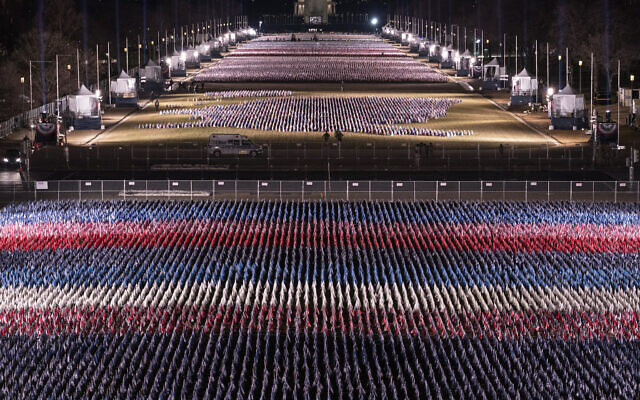 Flags are placed on the National Mall ahead of the inauguration of President-elect Joe Biden and Vice President-elect Kamala Harris, in Washington, January 18, 2021. (Alex Brandon/AP)
