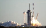 A Falcon 9 SpaceX rocket lifts off from pad 39A at the Kennedy Space Center in Cape Canaveral, Florida, January 20, 2021. (AP/John Raoux)