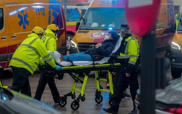 Health professionals evacuate an injured from the scene of an explosion in downtown Madrid, Spain on Jan. 20, 2021. (AP Photo/Paul White) Health professionals evacuate an injured from the scene of an explosion in downtown Madrid, Spain on Jan. 20, 2021. (AP Photo/Paul White)