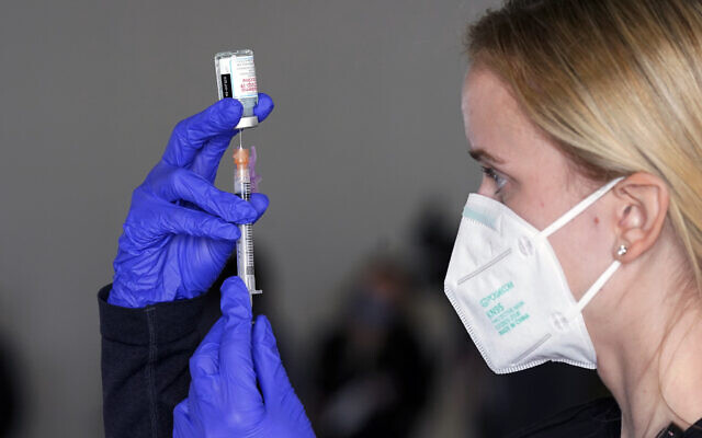A nurse draws a Moderna COVID-19 vaccine in Sacramento, California, January 21, 2021. (AP Photo/Rich Pedroncelli) A nurse draws a Moderna COVID-19 vaccine in Sacramento, California, January 21, 2021. (AP Photo/Rich Pedroncelli)