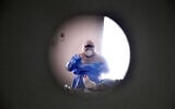 Illustrative: A Soroka Medical Center staff member works in the coronavirus ward on September 15, 2020. (Yossi Zeliger/Flash90)