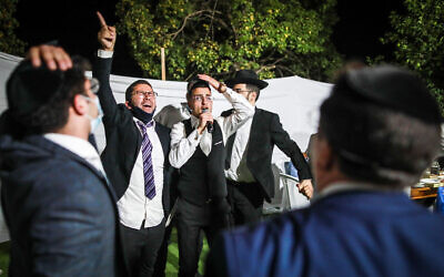 Illustrative image: A groom dances with family and friends during his wedding in Giv'at Ze'ev, outside Jerusalem on October 14, 2020. (Photo by Flash90)