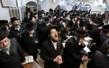 Illustrative: Ultra-Orthodox men during a ceremony in Meron, near Safed, on December 7, 2020. (David Cohen/Flash90)