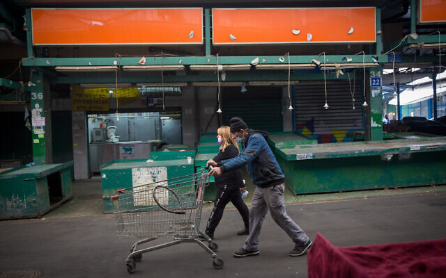 The closed down Hatikvah Market, during a nationwide lockdown, on January 3, 2021. (Miriam Alster/Flash90) The closed down Hatikvah Market, during a nationwide lockdown, on January 3, 2021. (Miriam Alster/Flash90)